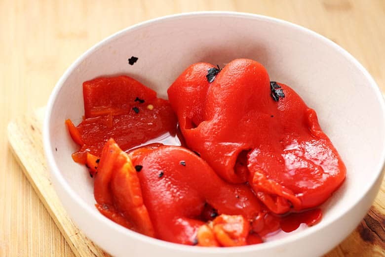 A small bowl of roasted red peppers.