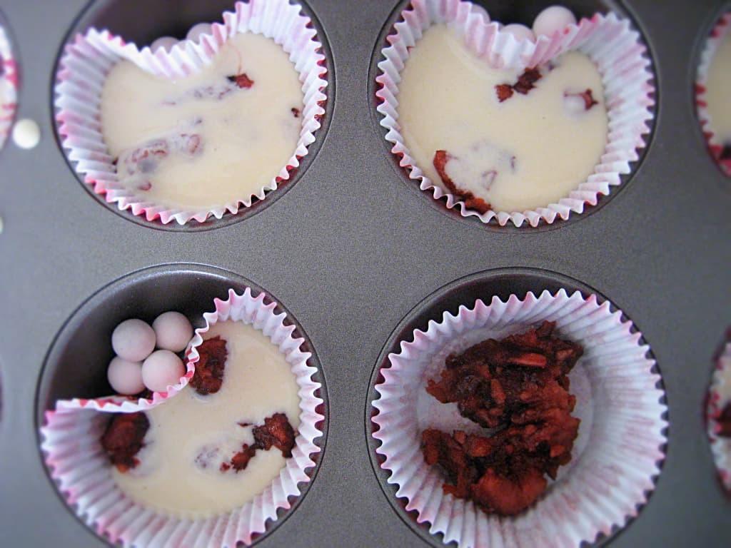 No need for heart-shaped cupcake molds, just use marbles or pie weights!