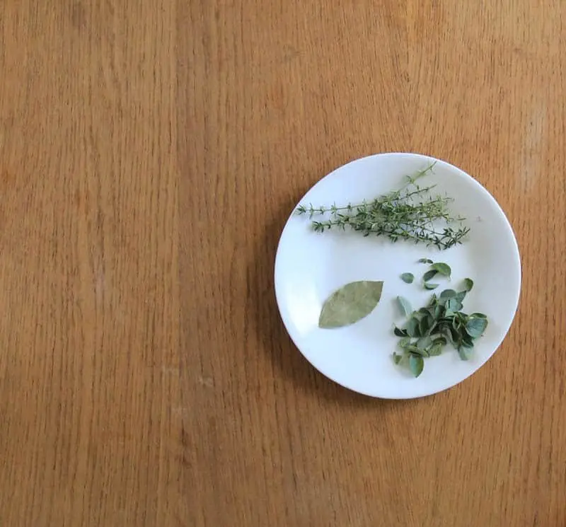 Fresh herbs on a plate.