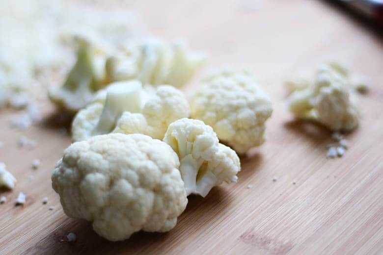 Asian Fusion Roasted Cauliflower and Parsnip Recipe - An easy and tasty vegetarian recipe of roasted cauliflower and parsnip with a drizzling of sesame oil, fish sauce and fresh lime juice. I am in LOVE with this dish! | FusionCraftiness.com