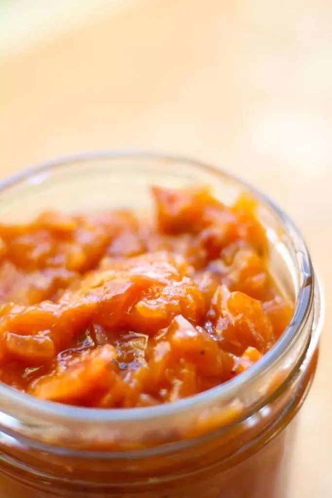 A jar of apricot chutney.