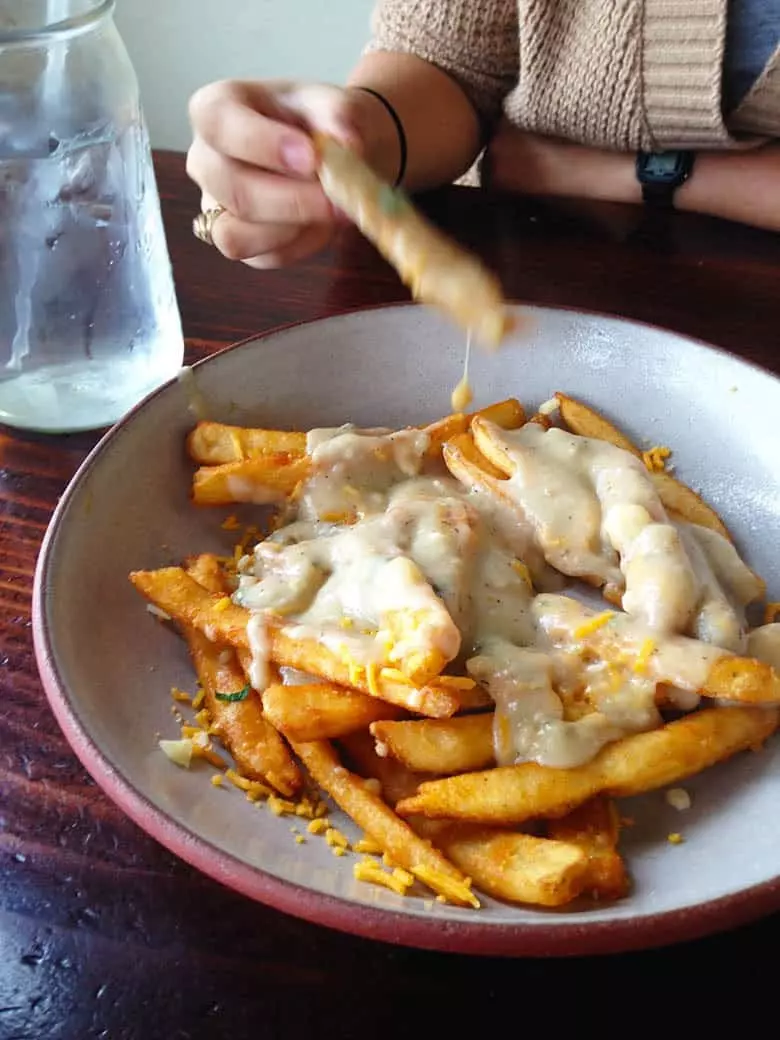 Trying Poutine for the first time.