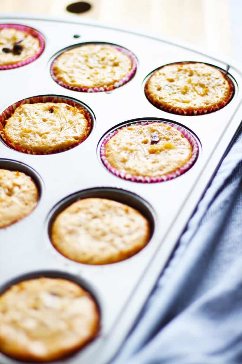 Muffin pan with cooked Kugel muffins.