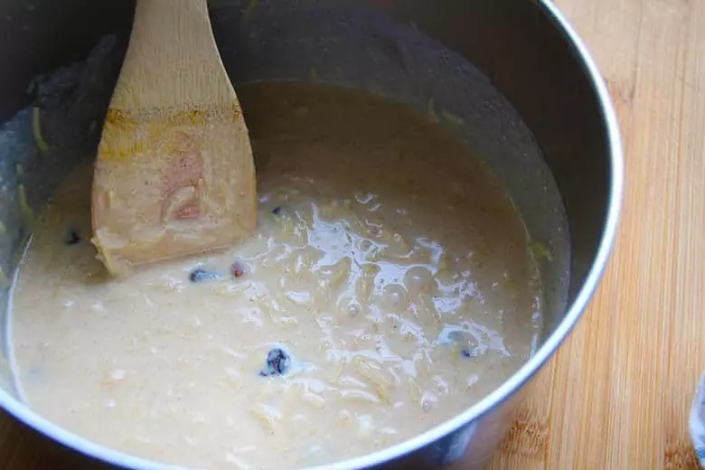 Vermicelli cooking with milk in a pot.