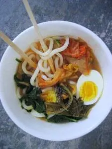 Super easy with cooked Udon noodles found in the frozen section. This Asian fusion soup whipped up in just a few minutes.