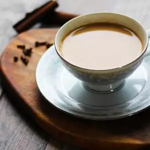 Indian Masala Chai Recipe. An authentic, Indian tea recipe flavored with cardamom, cinnamon, cloves, ginger and sugar. I lOVE making this!! It's a perfect cuppa anytime. | FusionCraftiness.com