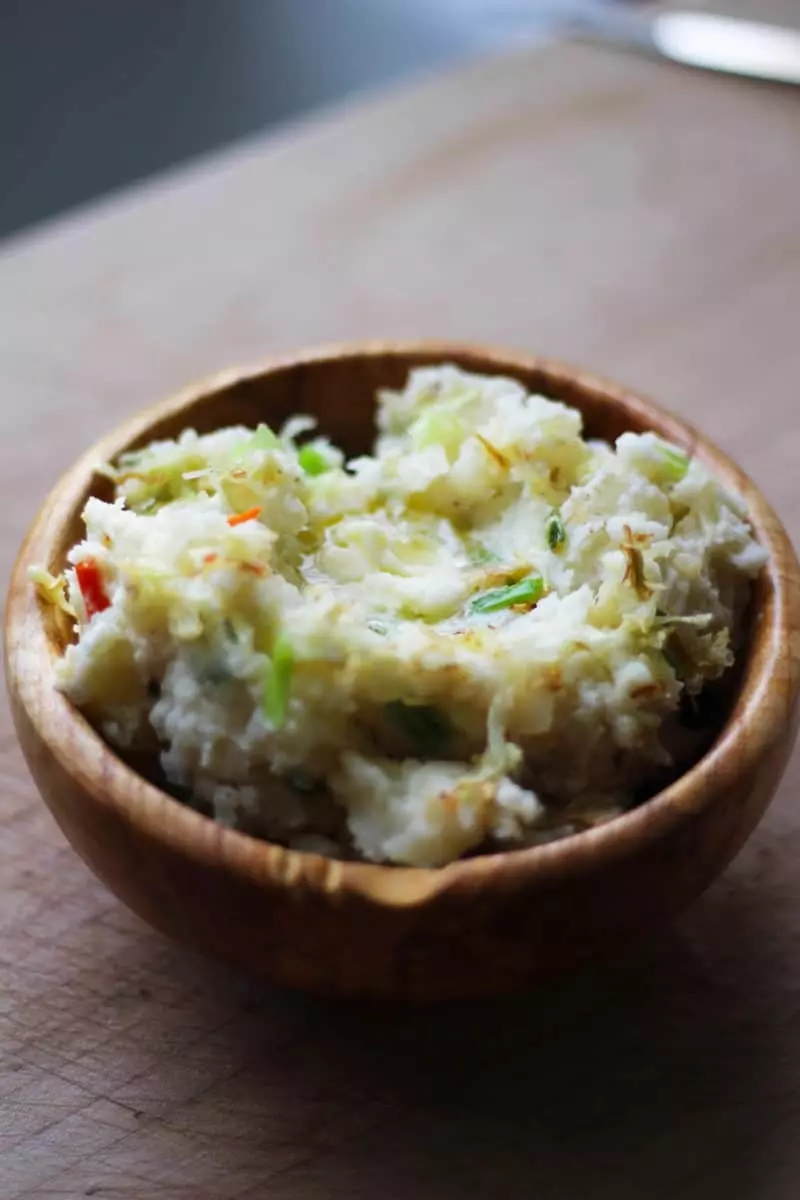 Easy Traditional Irish Colcannon Recipe, a tasty bowl of comfort food that can be whipped up in a snap! Make this the next time you need a hardy side or a meal for St. Patricks Day. | FusionCraftiness.com