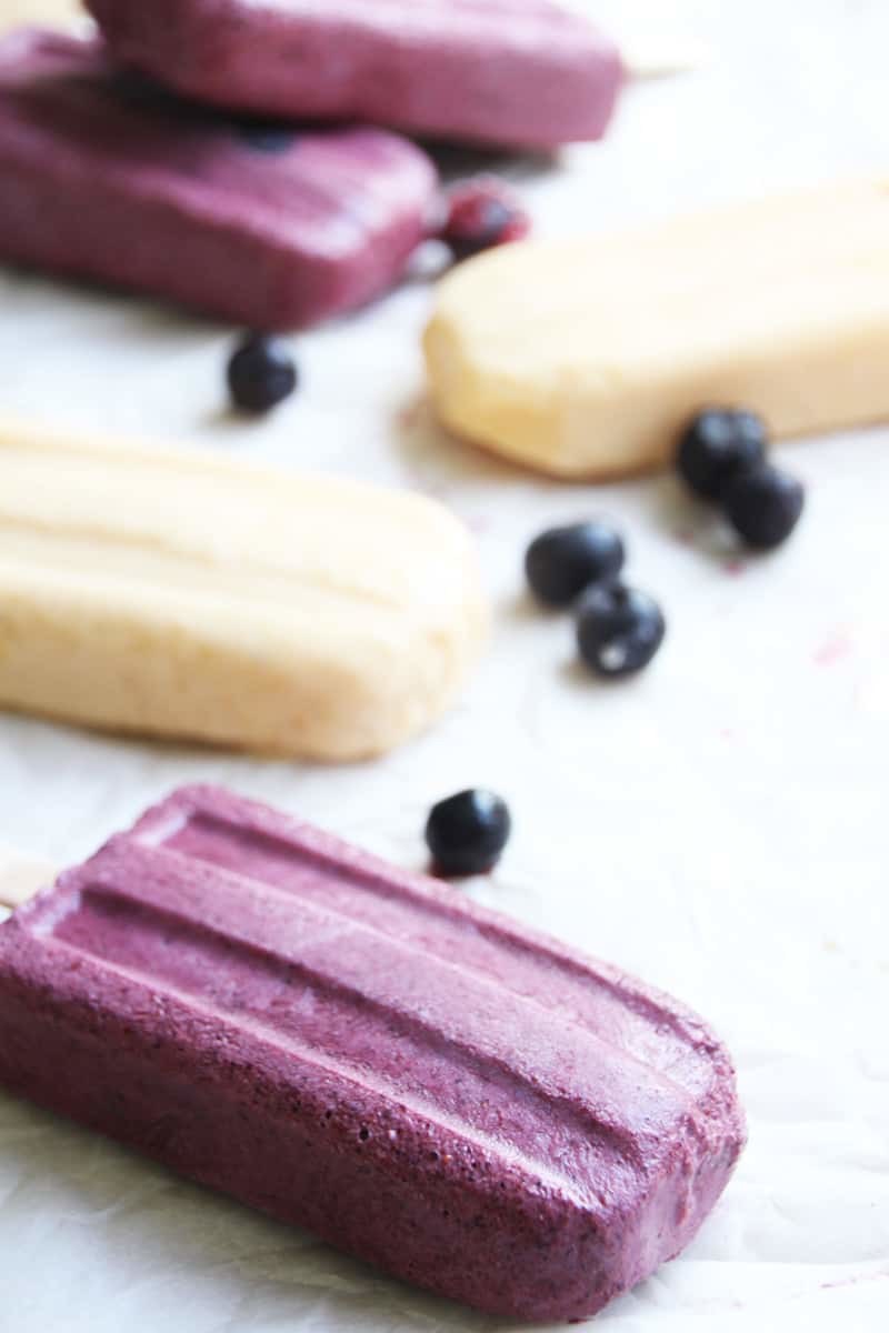 Fruit Froyo Smart Popsicles, a healthy and tasty alternative. Just fruit and healthy yogurt makes this popsicle SMART! Perfect for hot Summer days and the 4th of July! | FusionCraftiness.com