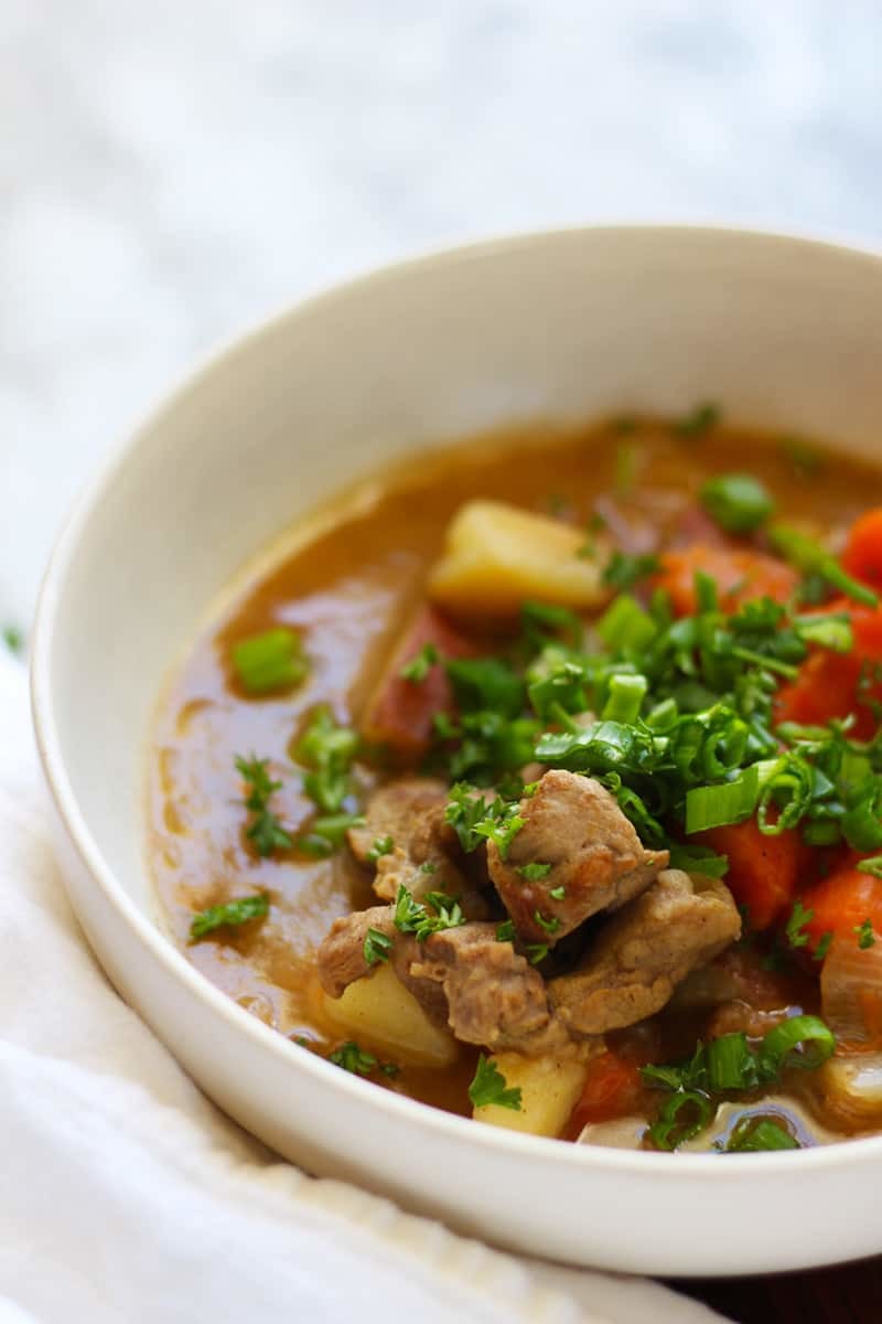 Traditional Easy Irish Stew Made Easy & Authentic with Lamb. This hearty stew with a thick gravy sauce can be made in a slow cooker or crockpot, perfect for dinner on a cold Winters' day. Make this for the family or for a crowd, this recipe easily scales up or down. Make this easy and healthy stew today!