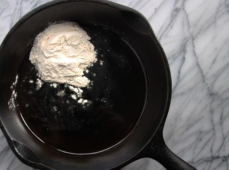 A pan with flour in it.