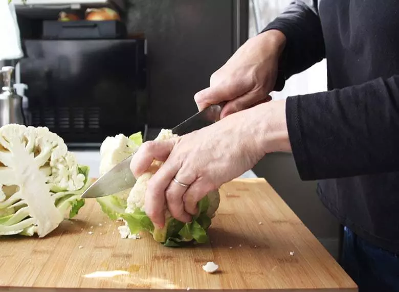 Cutting a cauliflower.