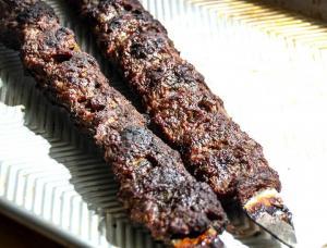 Cooked Persian kebab on skewer.