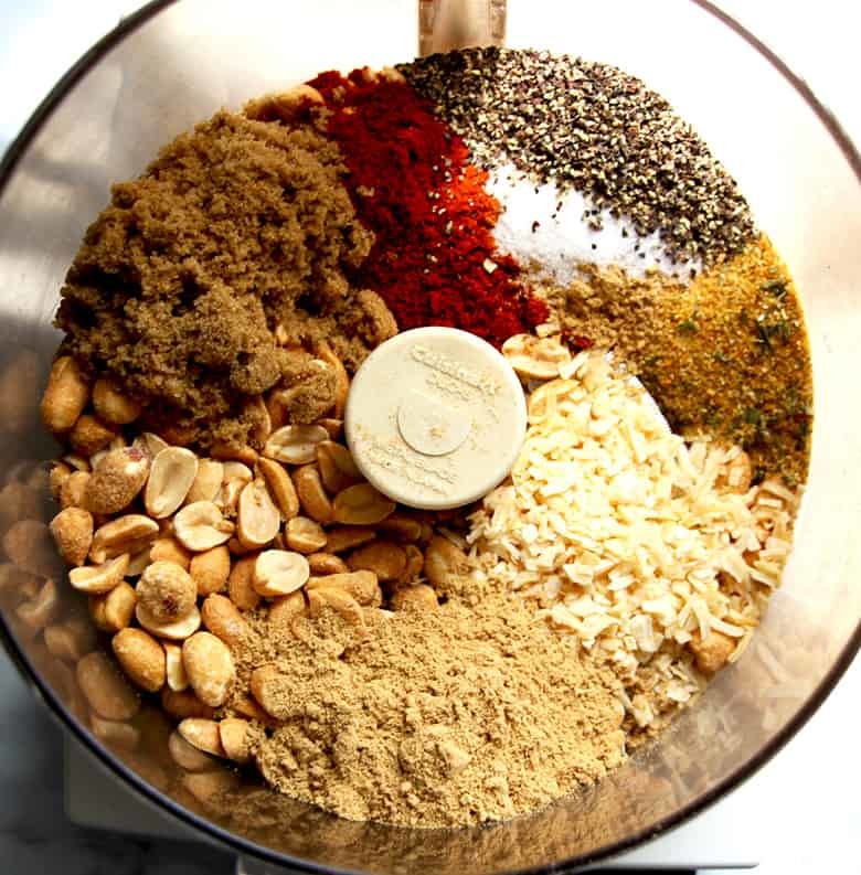 Suya spice and peanut Ingredients in a food processor.