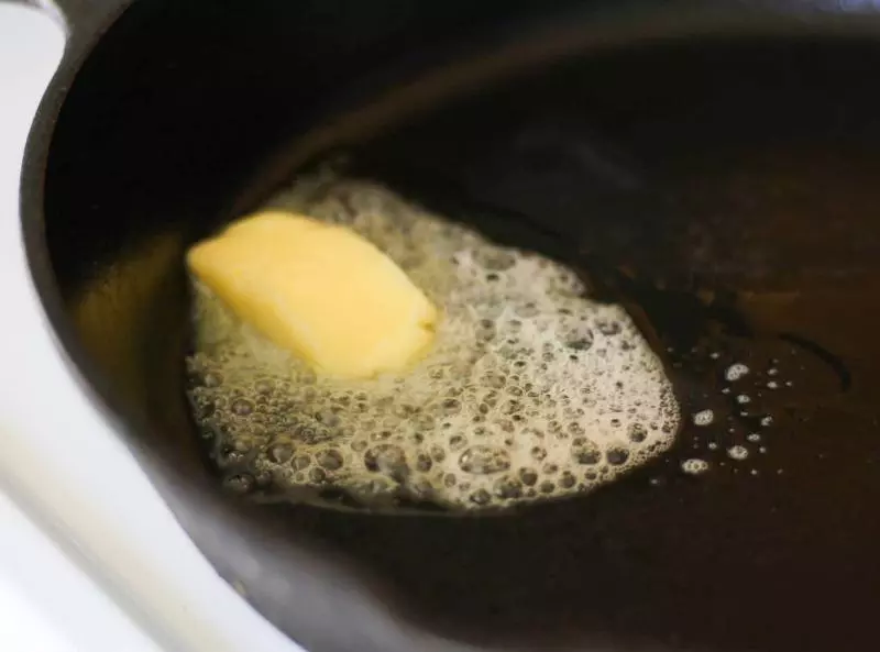 Butter in a cast iron skillet.