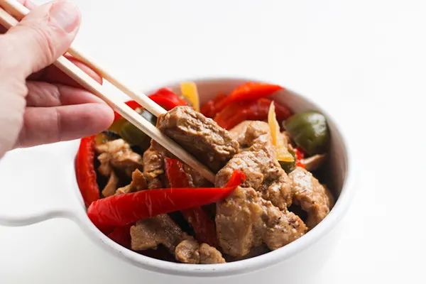 Using chopsticks with Hunan Pork.