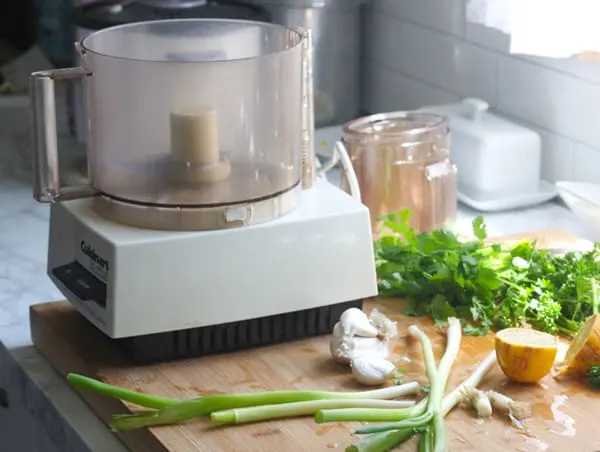 Food processor with vegetables.