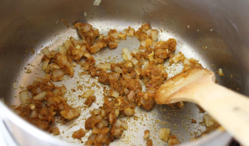Onions and Curry Paste in a pan.