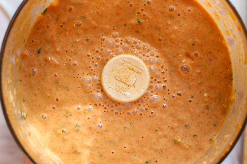 Pureed paprika sauce in a food processor.